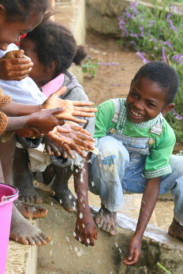 Children at EPP Ambanitsena washing their hands with soap and water before going home for lunch.