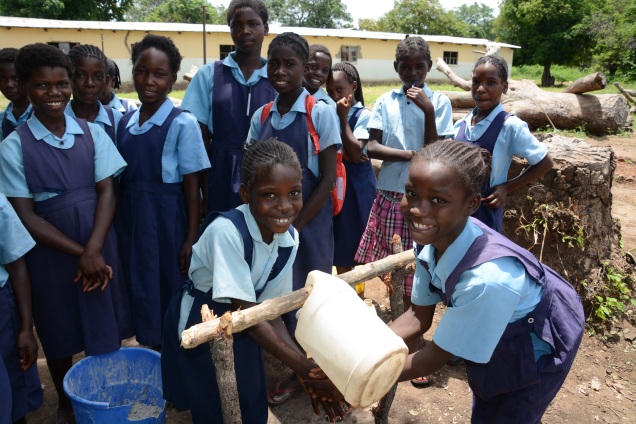 Through SPLASH, WASH-Friendly Schools in Zambia teach students about the importance of hand washing and provide hand washing stations nearby latrines.